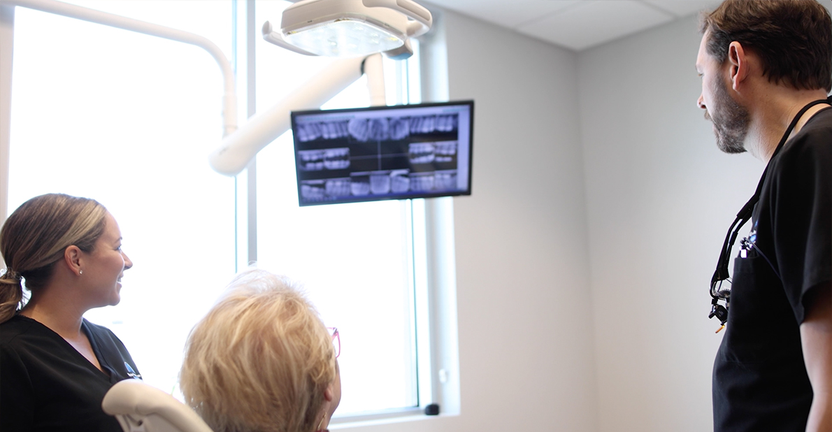 Emergency dentist in Atlanta showing a patient their x rays