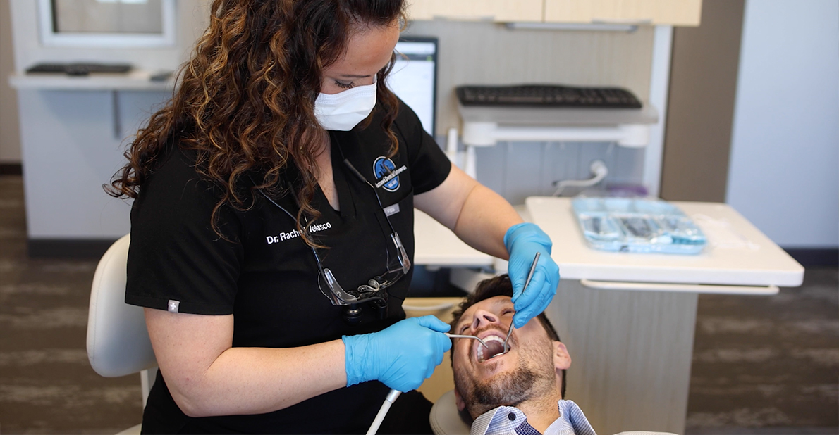 Dentist performing restorative dentistry treatment in Atlanta